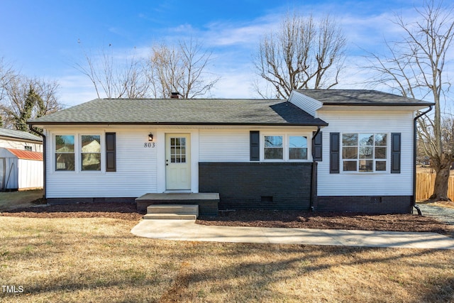 single story home with a front yard