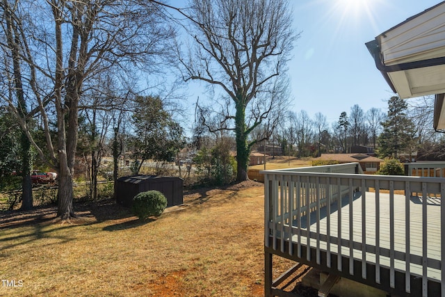 view of yard featuring a wooden deck