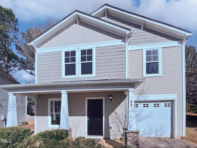 view of front of home featuring a garage and a porch