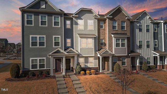 view of front of home with a lawn