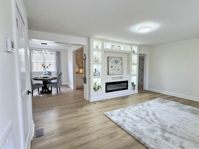 living room with wood-type flooring