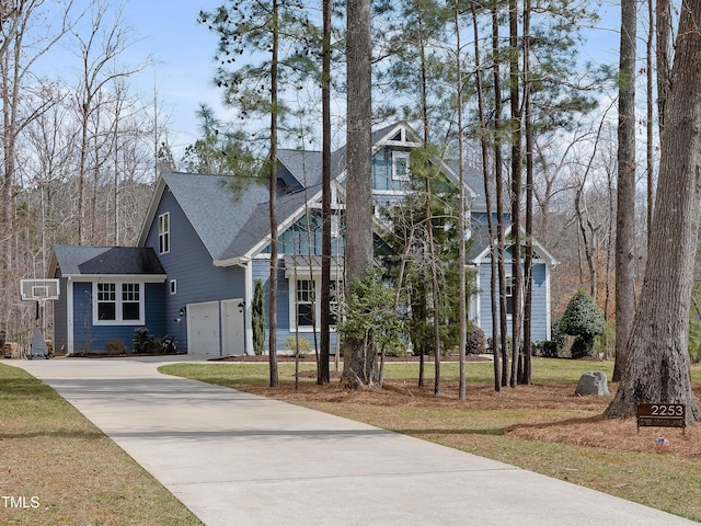 view of front facade featuring a garage and concrete driveway