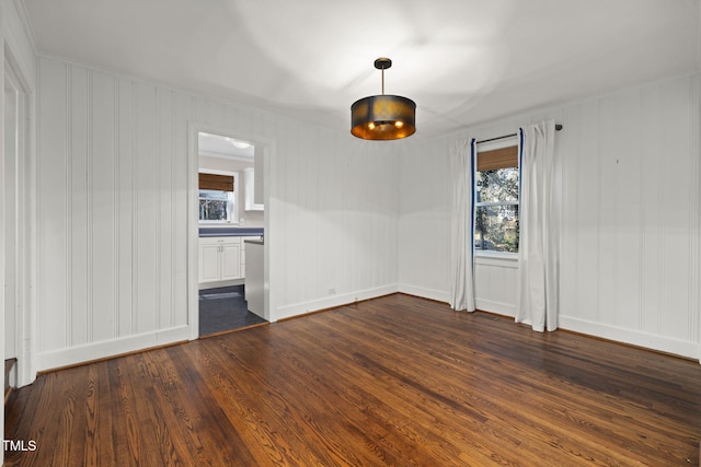 empty room featuring dark hardwood / wood-style floors