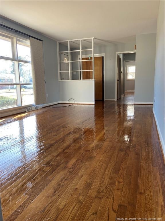 700 W 20th St W, Lumberton, NC 28358 - spare room featuring baseboards and wood finished floors