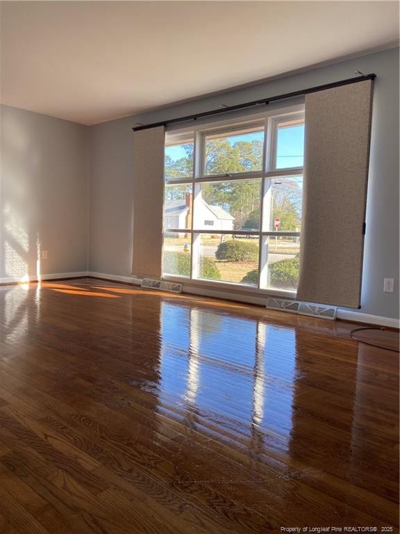700 W 20th St W, Lumberton, NC 28358 - empty room featuring baseboards and wood finished floors