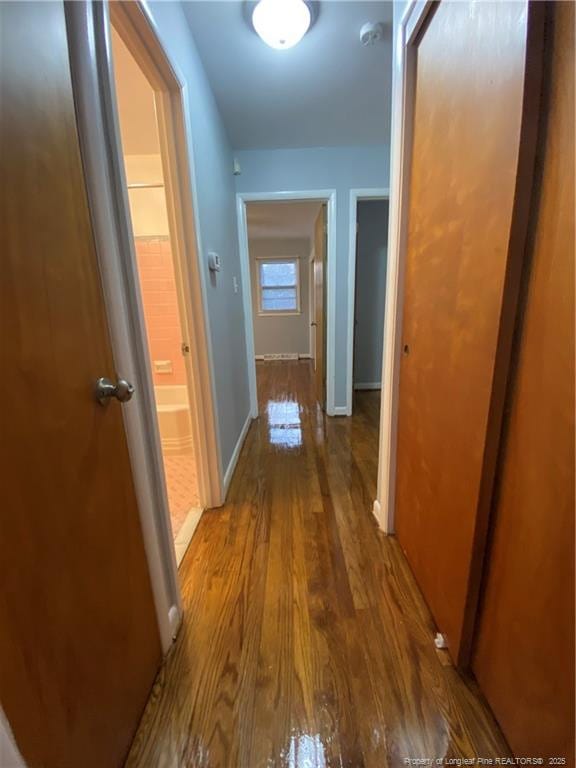 700 W 20th St W, Lumberton, NC 28358 - hall with wood finished floors and baseboards