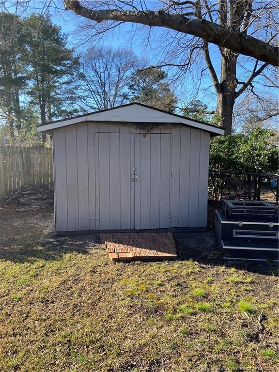 700 W 20th St W, Lumberton, NC 28358 - view of shed featuring fence