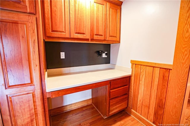 bathroom with hardwood / wood-style flooring