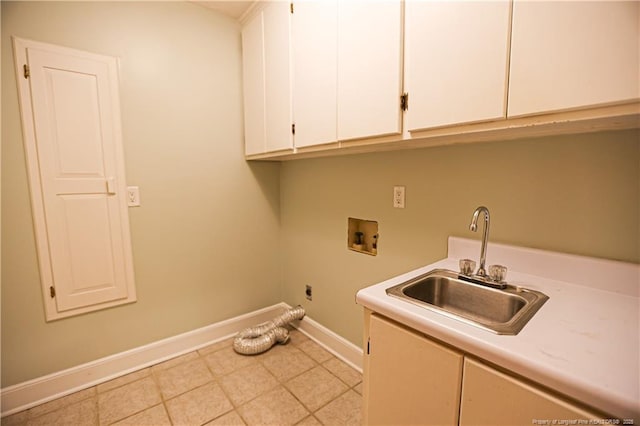 laundry area featuring light tile patterned flooring, sink, cabinets, washer hookup, and hookup for an electric dryer