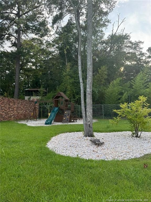 view of yard with a playground