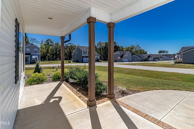 view of patio featuring a porch