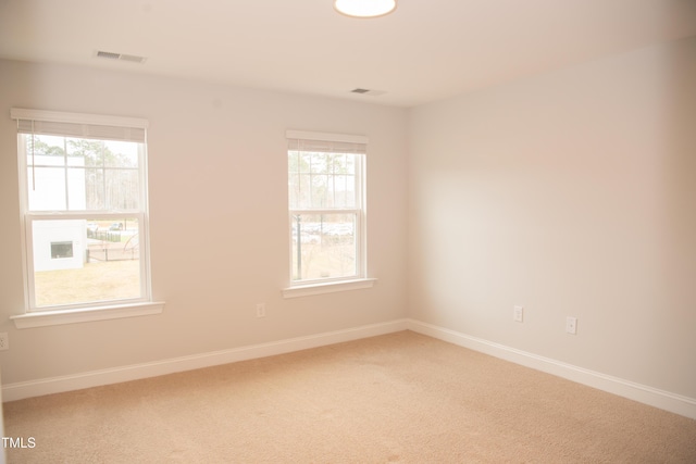 empty room with carpet flooring