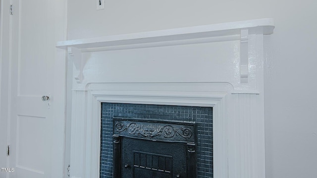 interior details featuring a fireplace