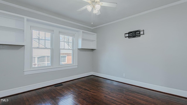 unfurnished room featuring dark wood-style floors, crown molding, visible vents, ceiling fan, and baseboards