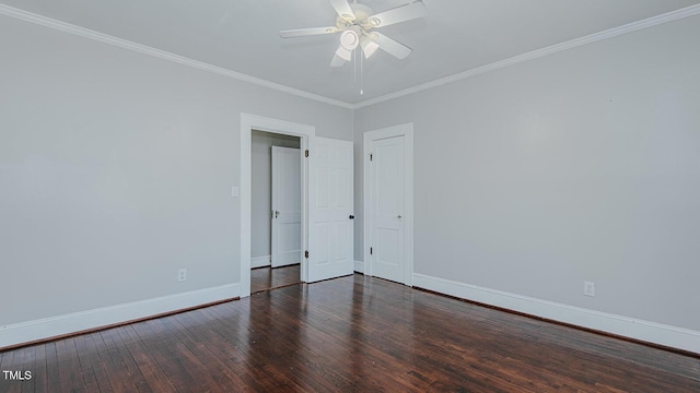 unfurnished room with a ceiling fan, crown molding, baseboards, and hardwood / wood-style flooring