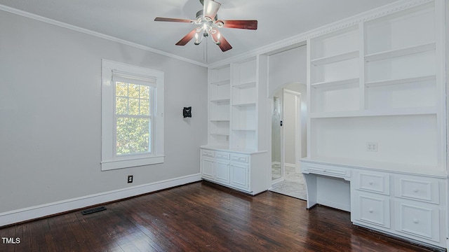 unfurnished bedroom featuring dark wood-style floors, ornamental molding, visible vents, and baseboards