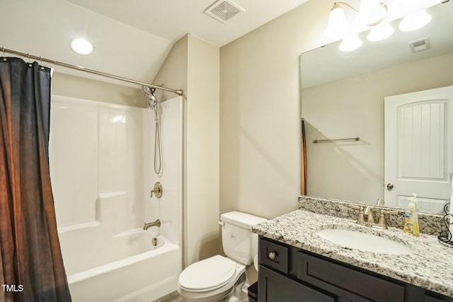 full bathroom with vanity, shower / tub combo with curtain, and toilet