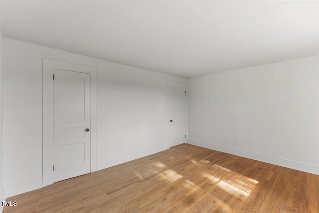 empty room featuring light hardwood / wood-style flooring