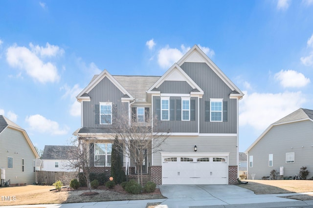 craftsman house with a garage