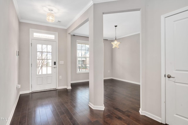 entrance foyer with crown molding and dark wood-type flooring