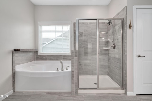 bathroom with independent shower and bath