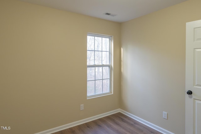 412 N Cooper St, Clayton, NC 27520 - spare room with dark wood finished floors and baseboards