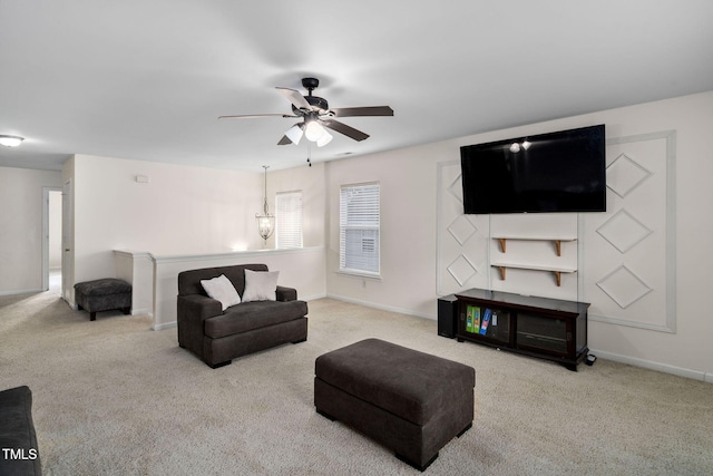 living room with ceiling fan and light carpet