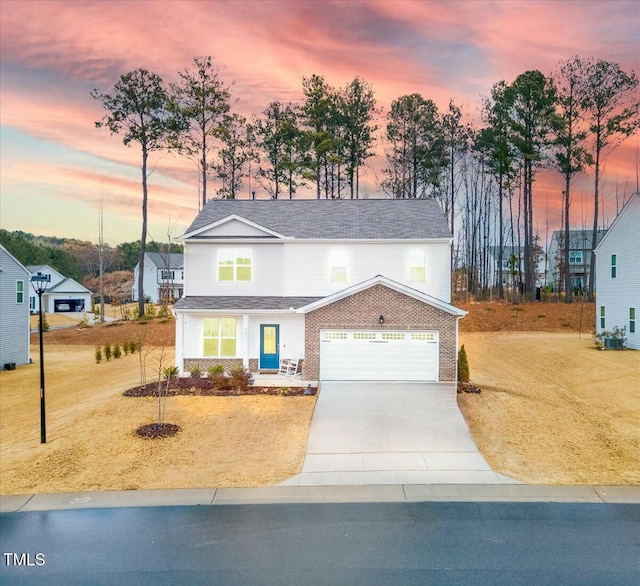 view of front of property with a garage