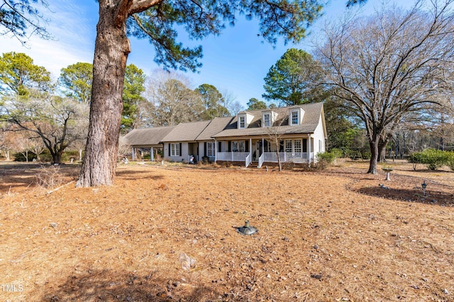 cape cod home with covered porch