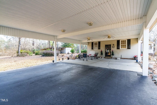 view of patio featuring ceiling fan