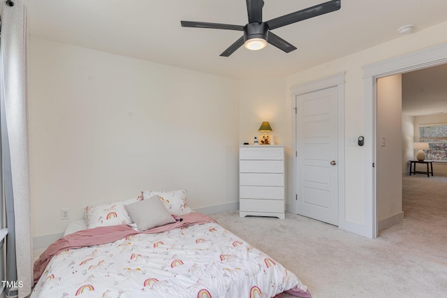 carpeted bedroom with ceiling fan