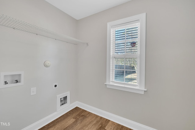 laundry room with electric dryer hookup, washer hookup, and hardwood / wood-style floors