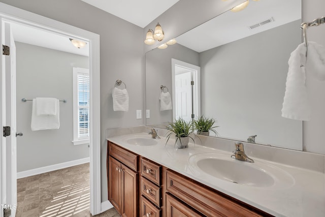 bathroom featuring vanity