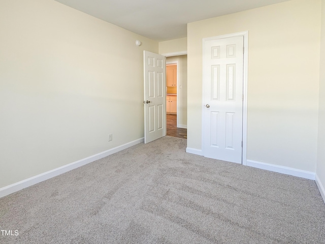 unfurnished bedroom featuring carpet floors