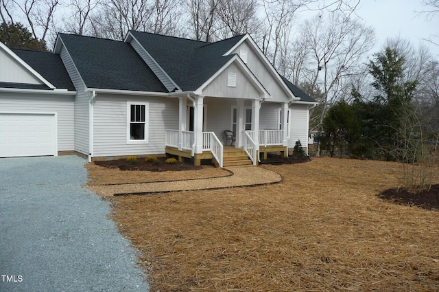 view of front of home featuring board and batten siding, a porch, roof with shingles, a garage, and driveway