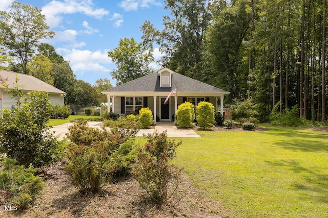 view of front of house featuring a front yard and covered porch