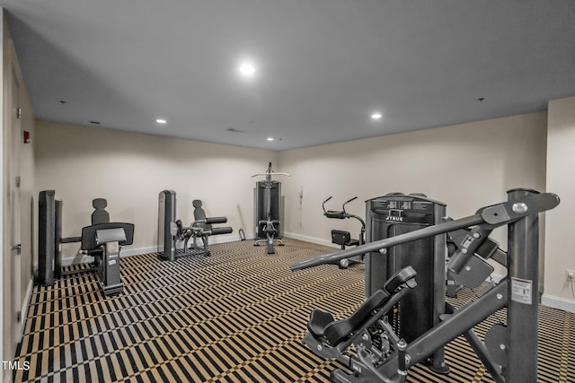 exercise room featuring recessed lighting, baseboards, and carpet