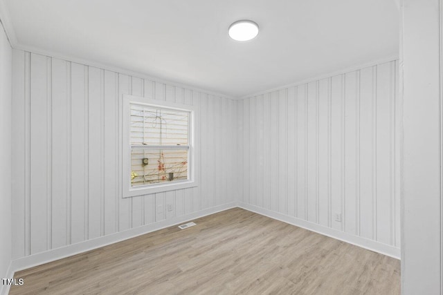 empty room with light wood-type flooring