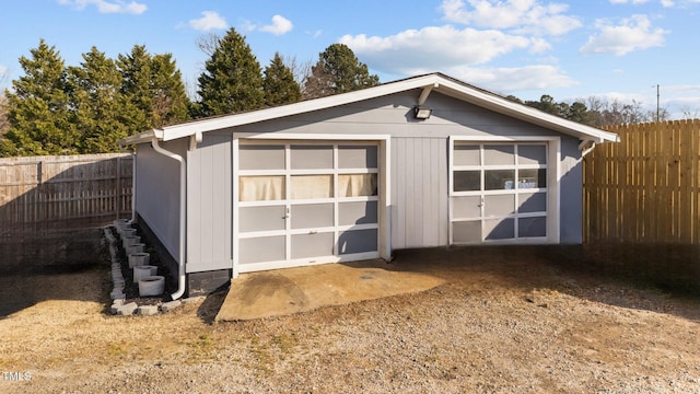 view of outdoor structure featuring a garage