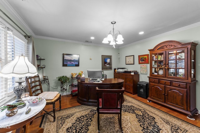 office with an inviting chandelier, wood-type flooring, and ornamental molding