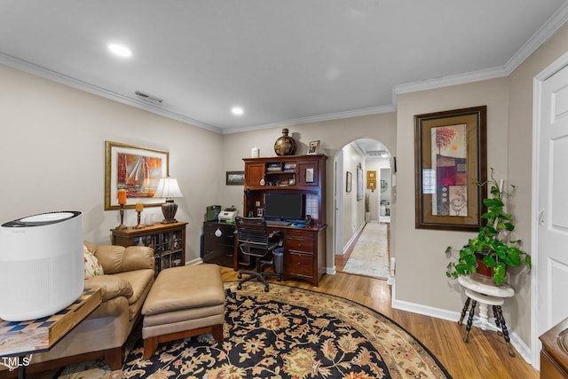 office area featuring ornamental molding and light wood-type flooring