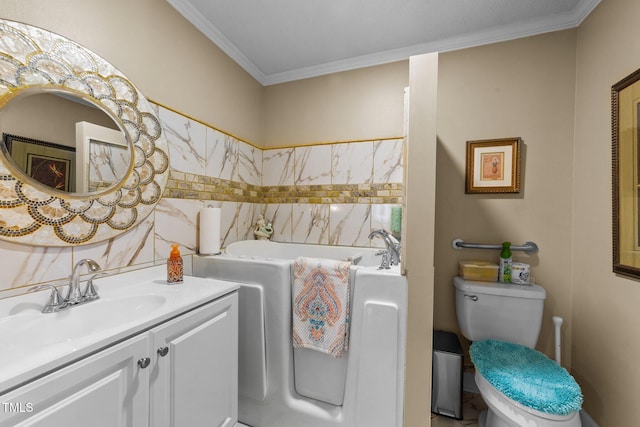 bathroom with vanity, crown molding, and toilet