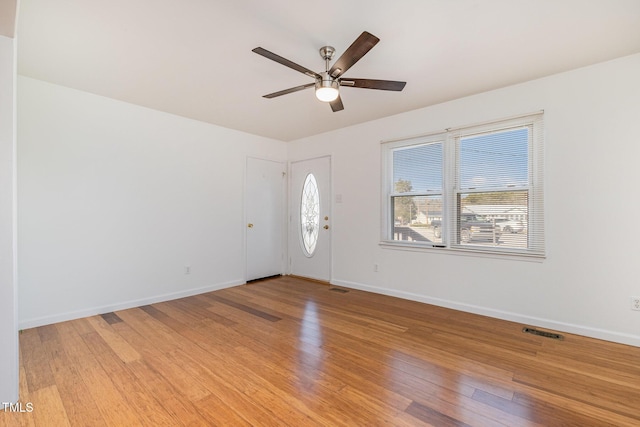 foyer entrance featuring ceiling fan and light hardwood / wood-style flooring