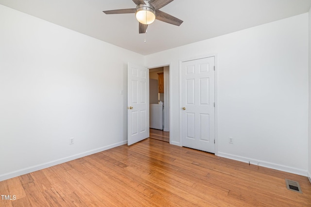 unfurnished room with ceiling fan and light hardwood / wood-style floors