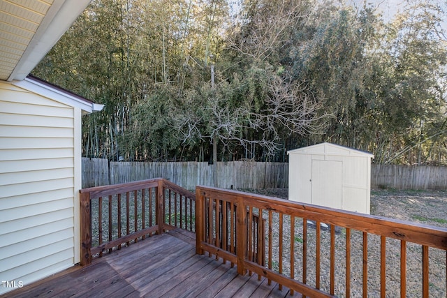 wooden terrace featuring a shed