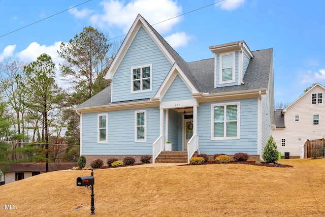 view of front of home with a front lawn