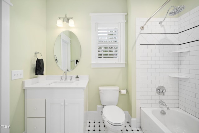 full bathroom with vanity, toilet, and tiled shower / bath combo