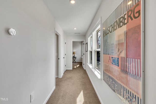 hallway with carpet