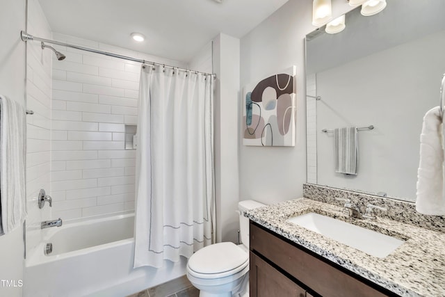 full bathroom featuring vanity, shower / tub combo, and toilet