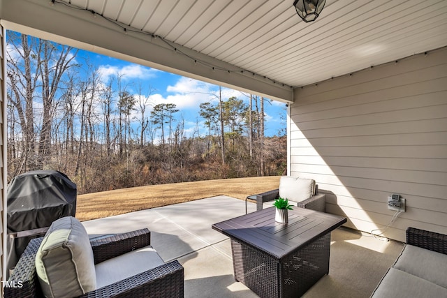 view of patio featuring grilling area and outdoor lounge area